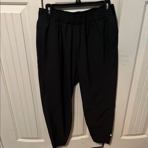 Nike Black Sweatpants with Elastic Waistband and Tapered Cuffs